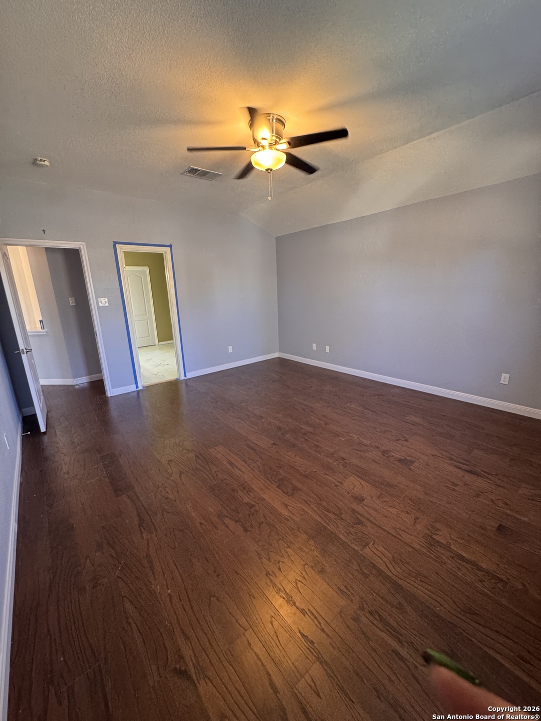 3836 Laurel Ridge Drive Round Rock, TX 78665 - Photo 19 of 40 wooden floor in an empty room with a window