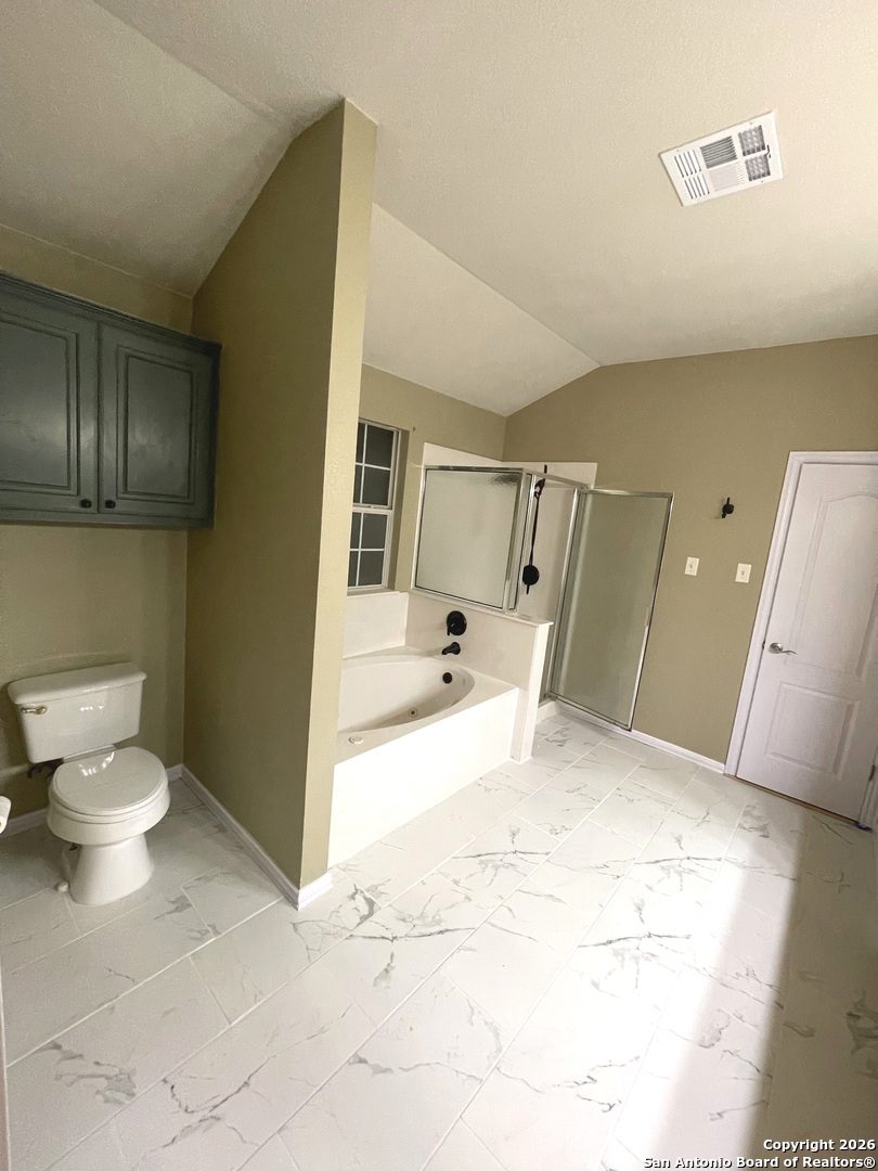 3836 Laurel Ridge Drive Round Rock, TX 78665 - Photo 23 of 40 a bathroom with a sink a toilet and a tub