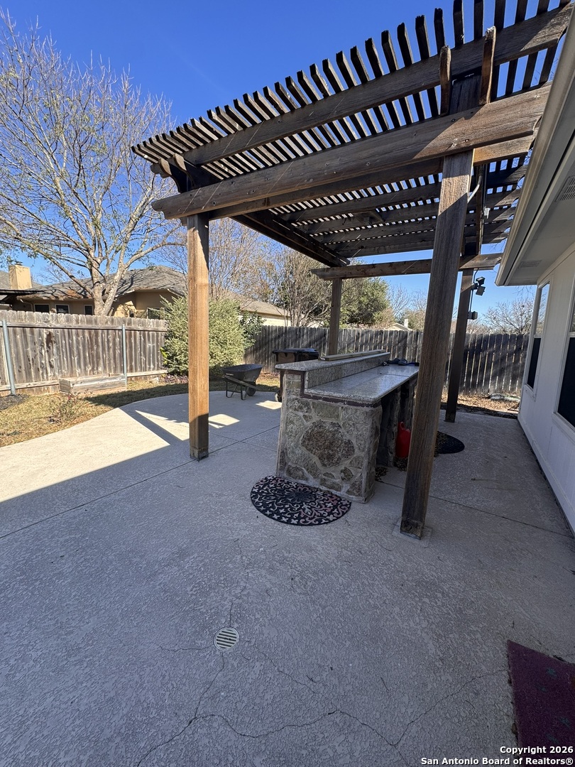 3836 Laurel Ridge Drive Round Rock, TX 78665 - Photo 36 of 40 a view of a porch with furniture and a yard