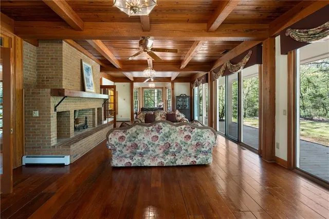 a view of a dining room with furniture and window