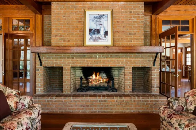 a kitchen with refrigerator and furniture
