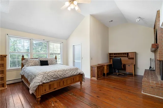 a big yard with lots of green space and trees