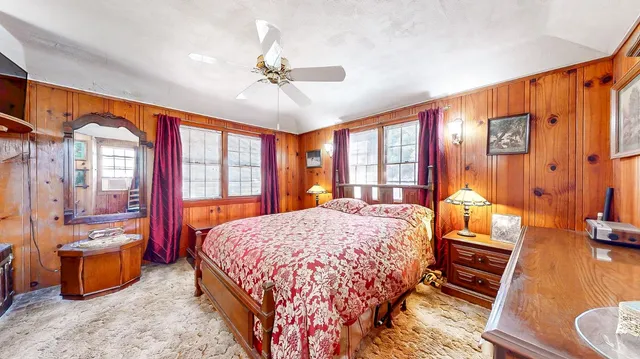 a view of a bedroom with gym equipment