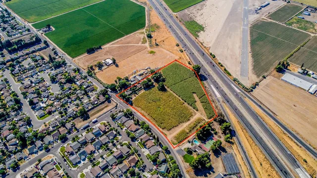 a view of a yard with an outdoor seating