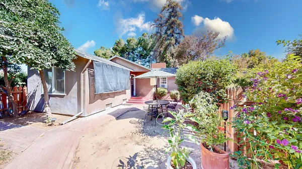 a view of a back yard of the house