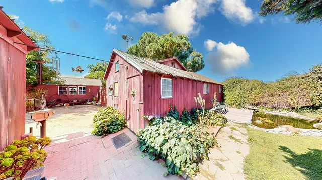 a view of street with parked cars