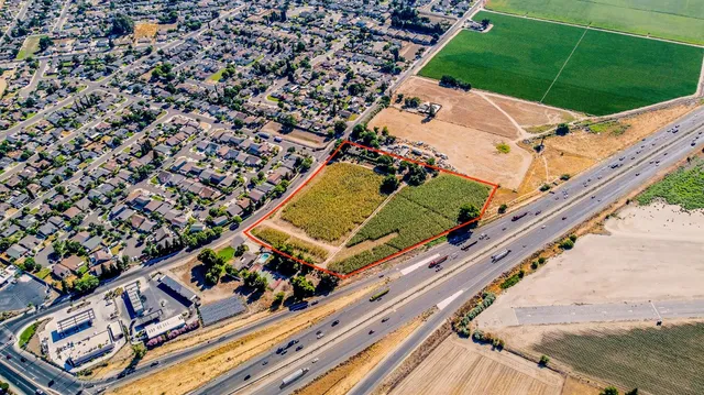 a view of building with parking area