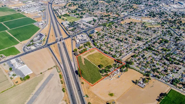 a view of swimming pool with a yard