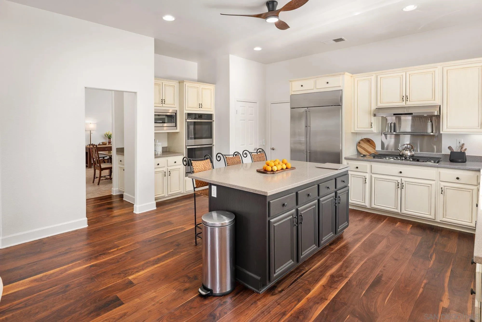 424 Sky Mesa Road Alpine, CA 91901 - Photo 23 of 75 a kitchen with a sink cabinets and wooden floor