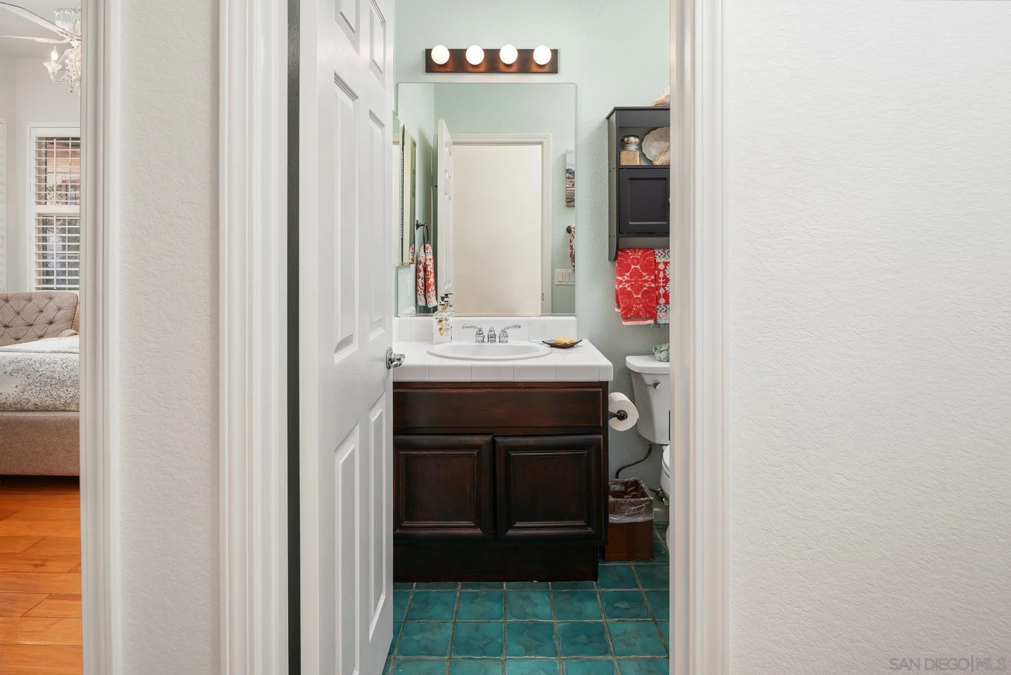 424 Sky Mesa Road Alpine, CA 91901 - Photo 40 of 75 a bathroom with a sink and a mirror
