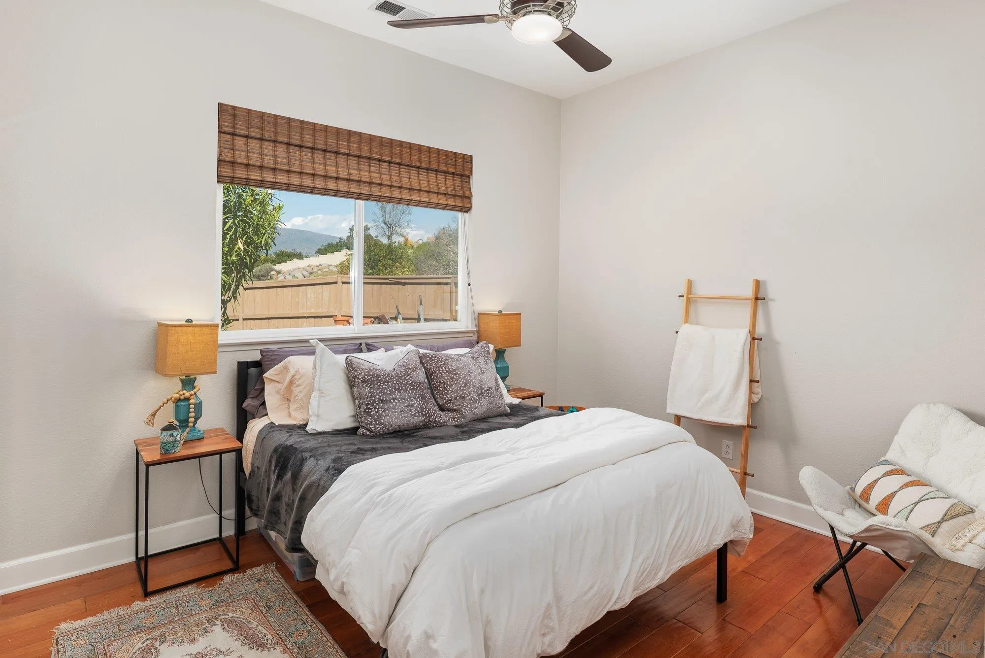 424 Sky Mesa Road Alpine, CA 91901 - Photo 42 of 75 a bedroom with a bed and a window