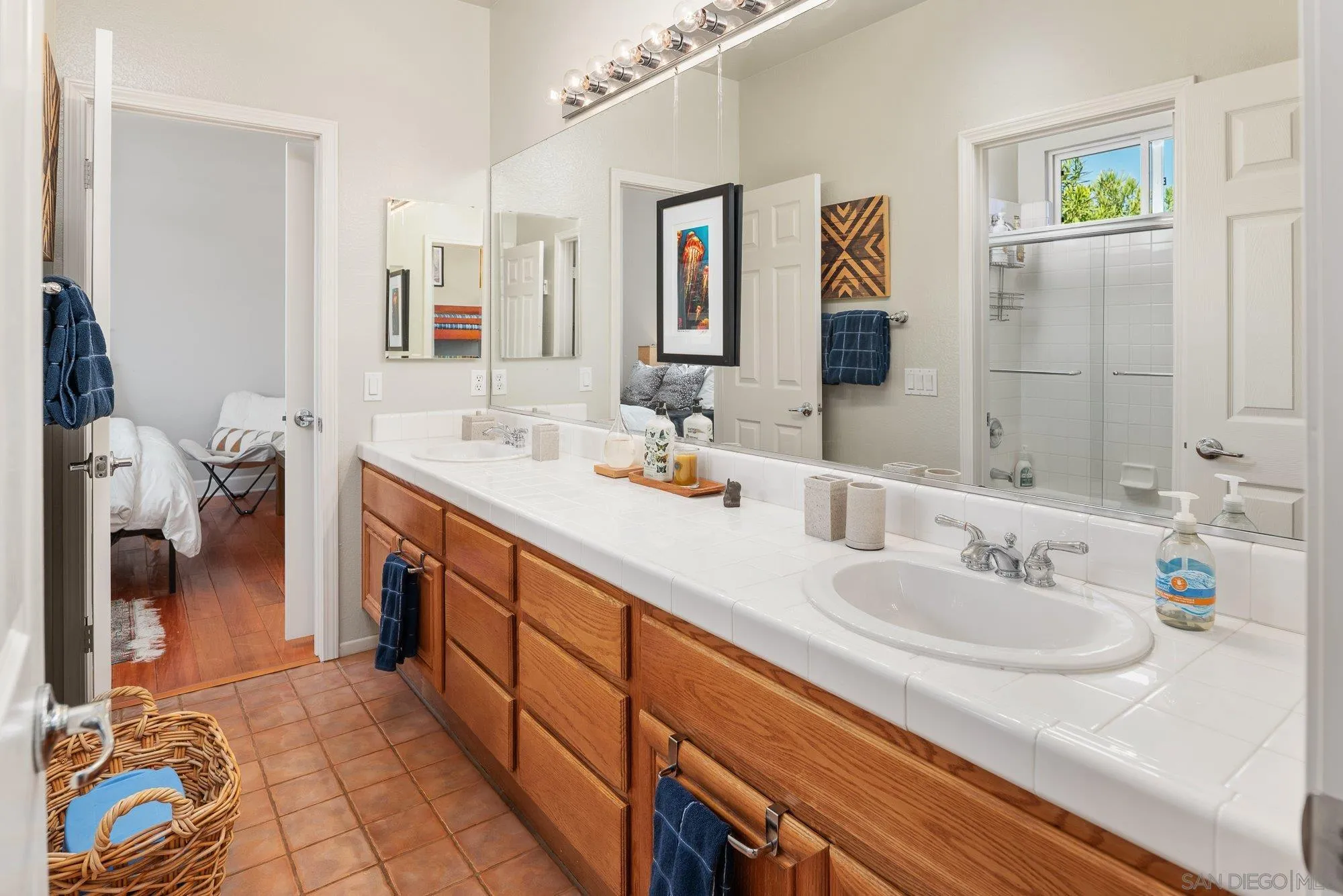 424 Sky Mesa Road Alpine, CA 91901 - Photo 45 of 75 a spacious bathroom with a double vanity sink and a mirror