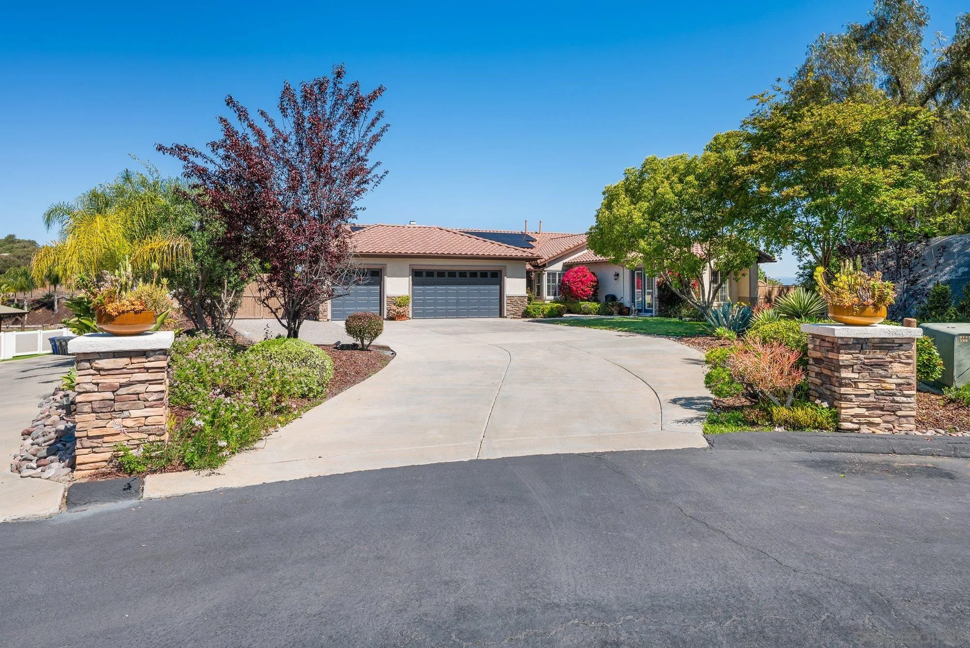 424 Sky Mesa Road Alpine, CA 91901 - Photo 5 of 75 front view of a house with a yard and potted plants