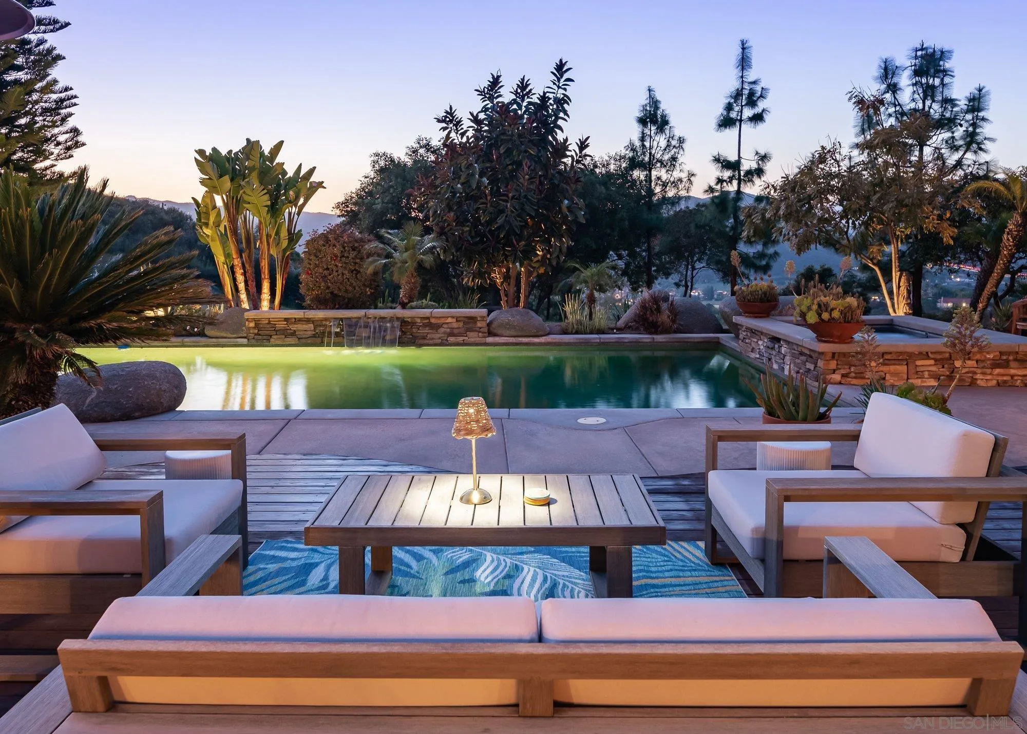 424 Sky Mesa Road Alpine, CA 91901 - Photo 53 of 75 a view of a patio with couches chairs and a fire pit