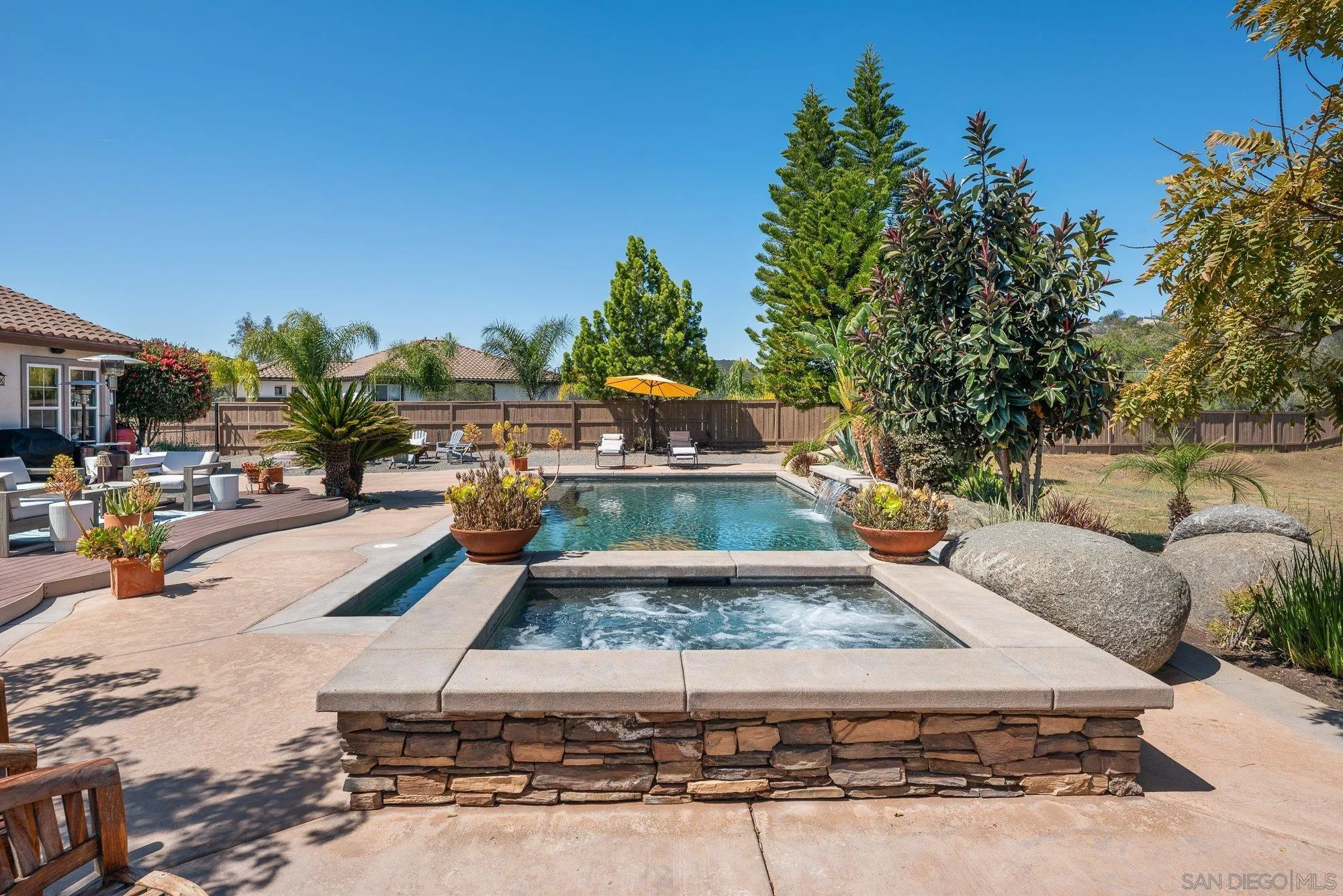 424 Sky Mesa Road Alpine, CA 91901 - Photo 59 of 75 a view of a yard with cars park