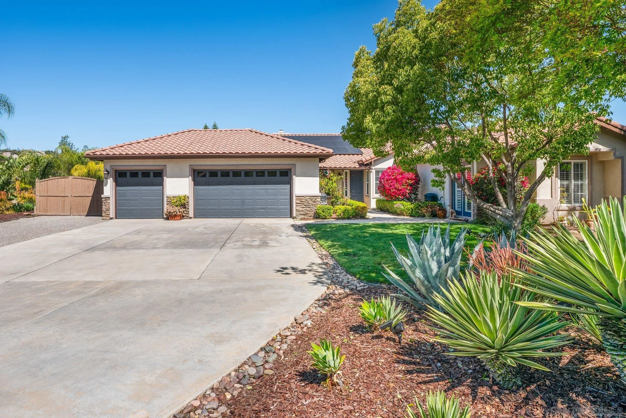 424 Sky Mesa Road Alpine, CA 91901 - Photo 9 of 75 a view of a house with a small yard