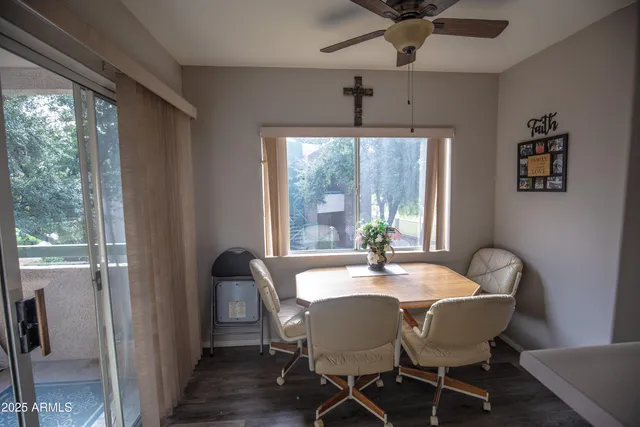 a bedroom with a bed and a bookshelf