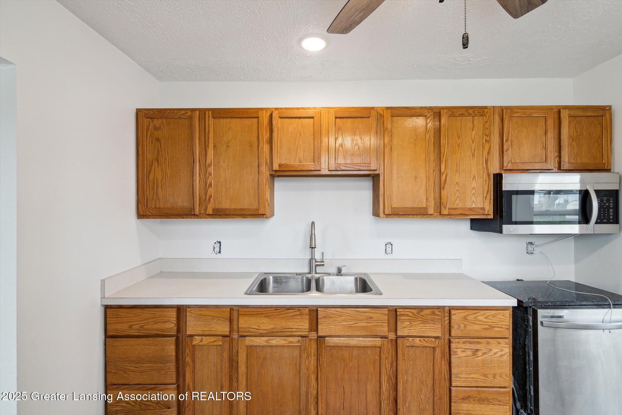 6306 Grovenburg Road Lansing, MI 48911 - Photo 11 of 31 13-6306-Grovenburg-Rd-Lansing-MI-48911-W