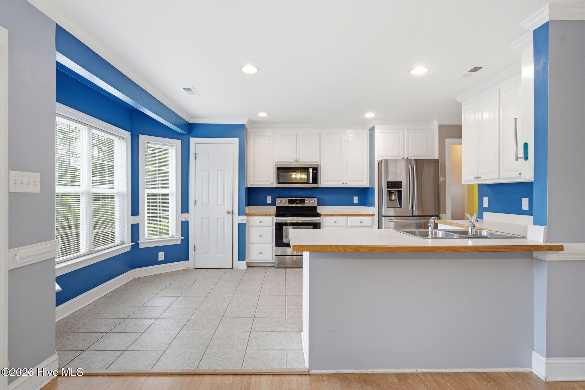 324 Ash Road Southport, NC 28461 - Photo 11 of 34 View from family room looking into the kitchen