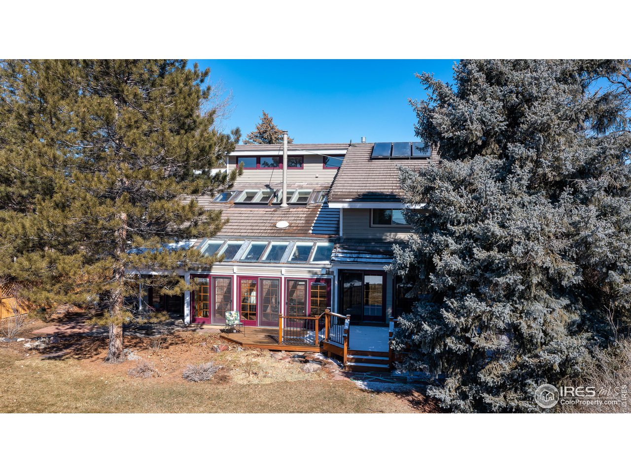6142 Old Brompton Road Boulder, CO 80301 - Photo 6 of 30 Sunroom and back deck