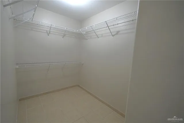a view of a room with racks on the wall