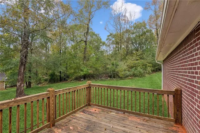 a view of a wooden roof deck