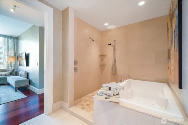 a bathroom with a tub and a shower curtain