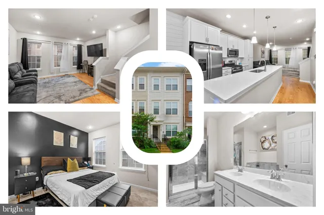 a view of kitchen with stainless steel appliances kitchen island granite countertop a sink and cabinets