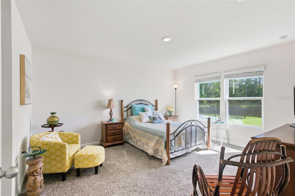 2 Pinnacle Place Bunnell, FL 32110 - Photo 29 of 83 a bedroom with furniture and a large window