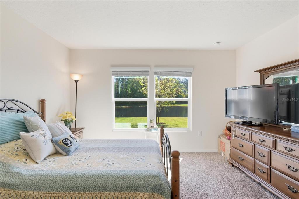 2 Pinnacle Place Bunnell, FL 32110 - Photo 31 of 83 a living room with furniture and a flat screen tv