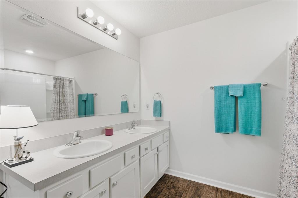 2 Pinnacle Place Bunnell, FL 32110 - Photo 37 of 83 a bathroom with a sink and a mirror