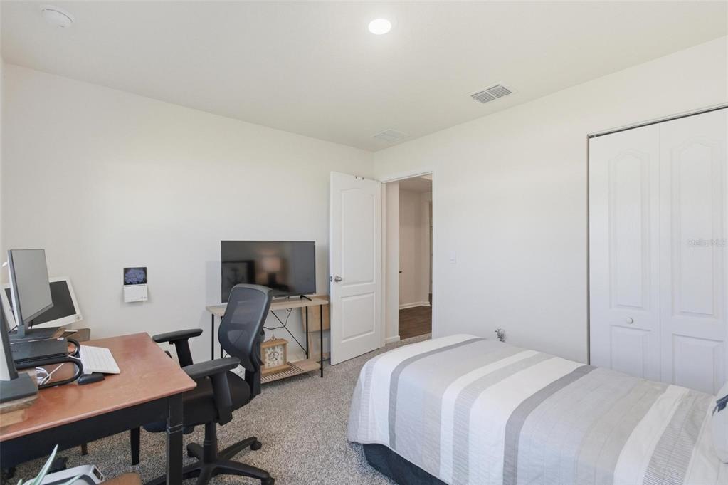 2 Pinnacle Place Bunnell, FL 32110 - Photo 45 of 83 a bedroom with a workspace