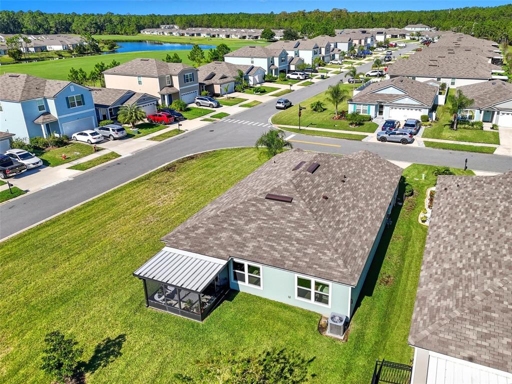 2 Pinnacle Place Bunnell, FL 32110 - Photo 63 of 83 an aerial view of a house with a garden and lake view