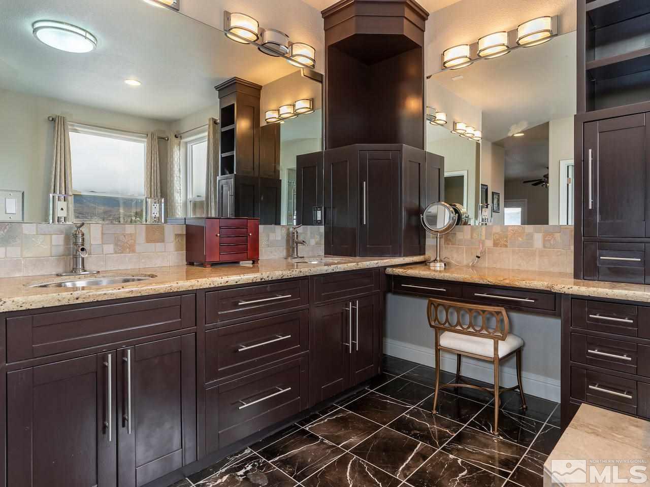 13520 Rim Rock Drive Reno, NV 89521 - Photo 23 of 25 a kitchen with a sink and cabinets
