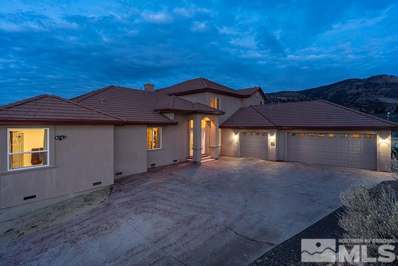 13520 Rim Rock Drive Reno, NV 89521 - Photo 3 of 25 a view of an house with backyard space and balcony