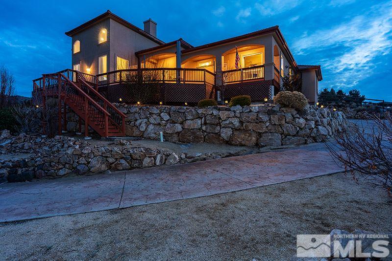 13520 Rim Rock Drive Reno, NV 89521 - Photo 5 of 25 a front view of house with a yard