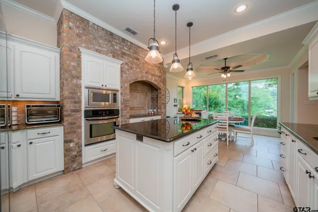 a bedroom with a bed and a cabinets