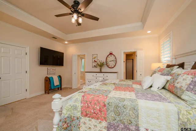 a spacious bathroom with a double vanity sink shower and a mirror