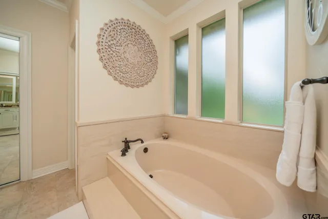 a room with a sink and cabinets