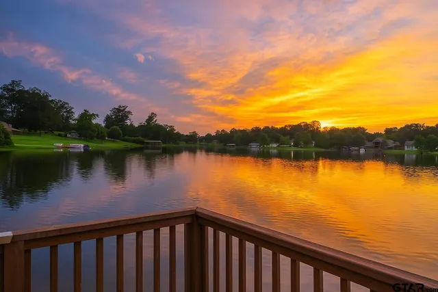 a view of a lake from a balcony