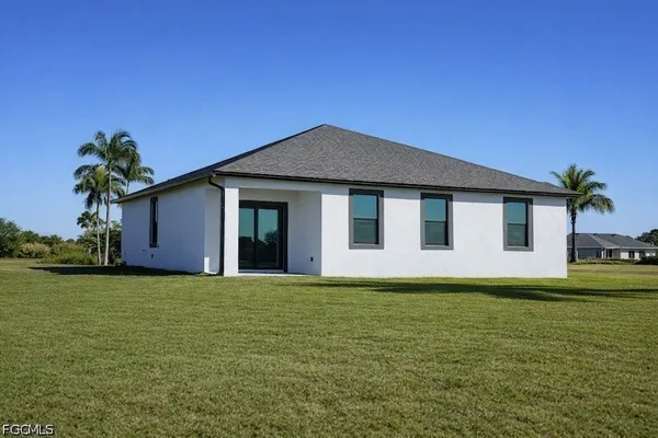 a house with garden in front of it