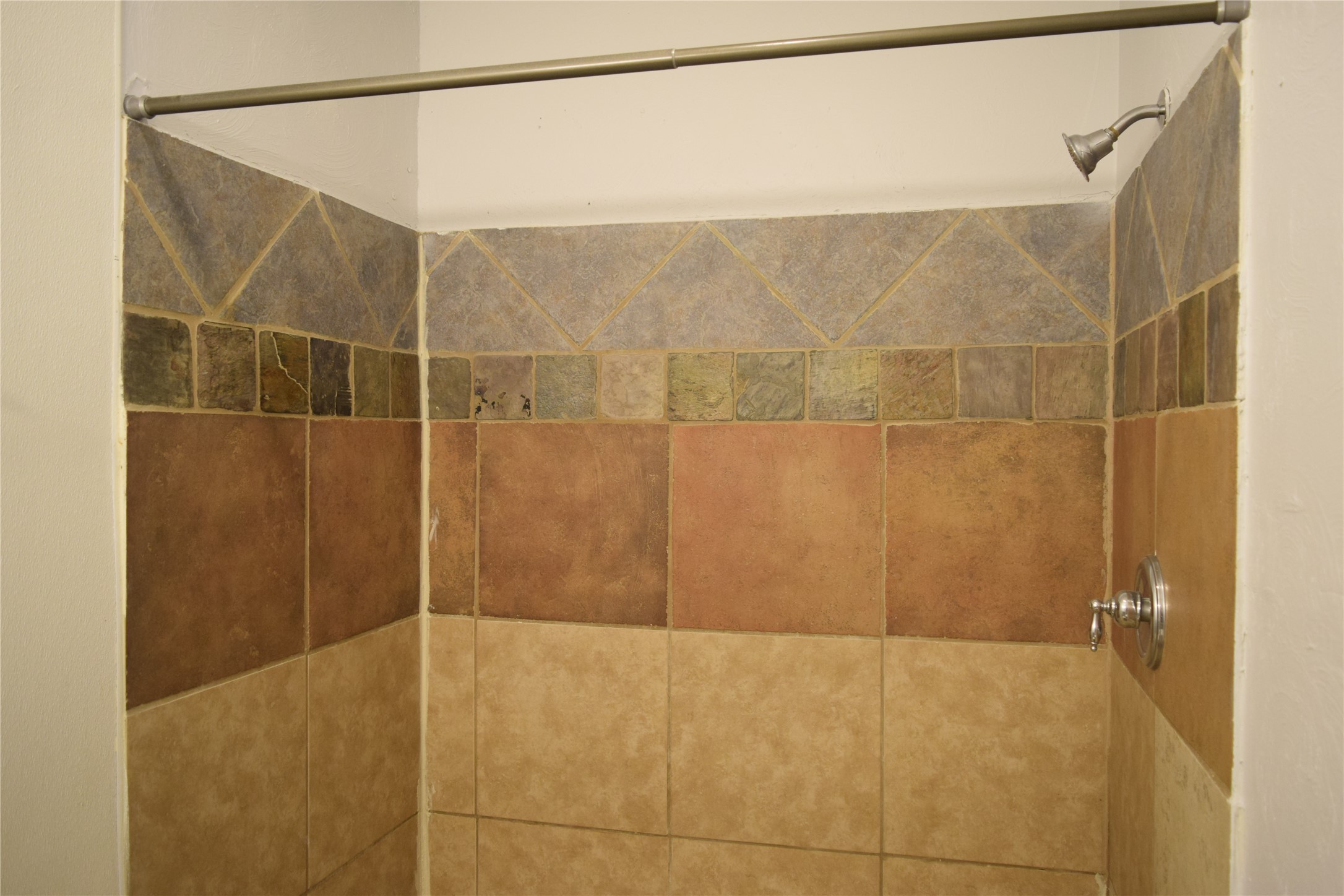 9902 Tolman Street Houston, TX 77034 - Photo 21 of 26 a bathroom with a shower
