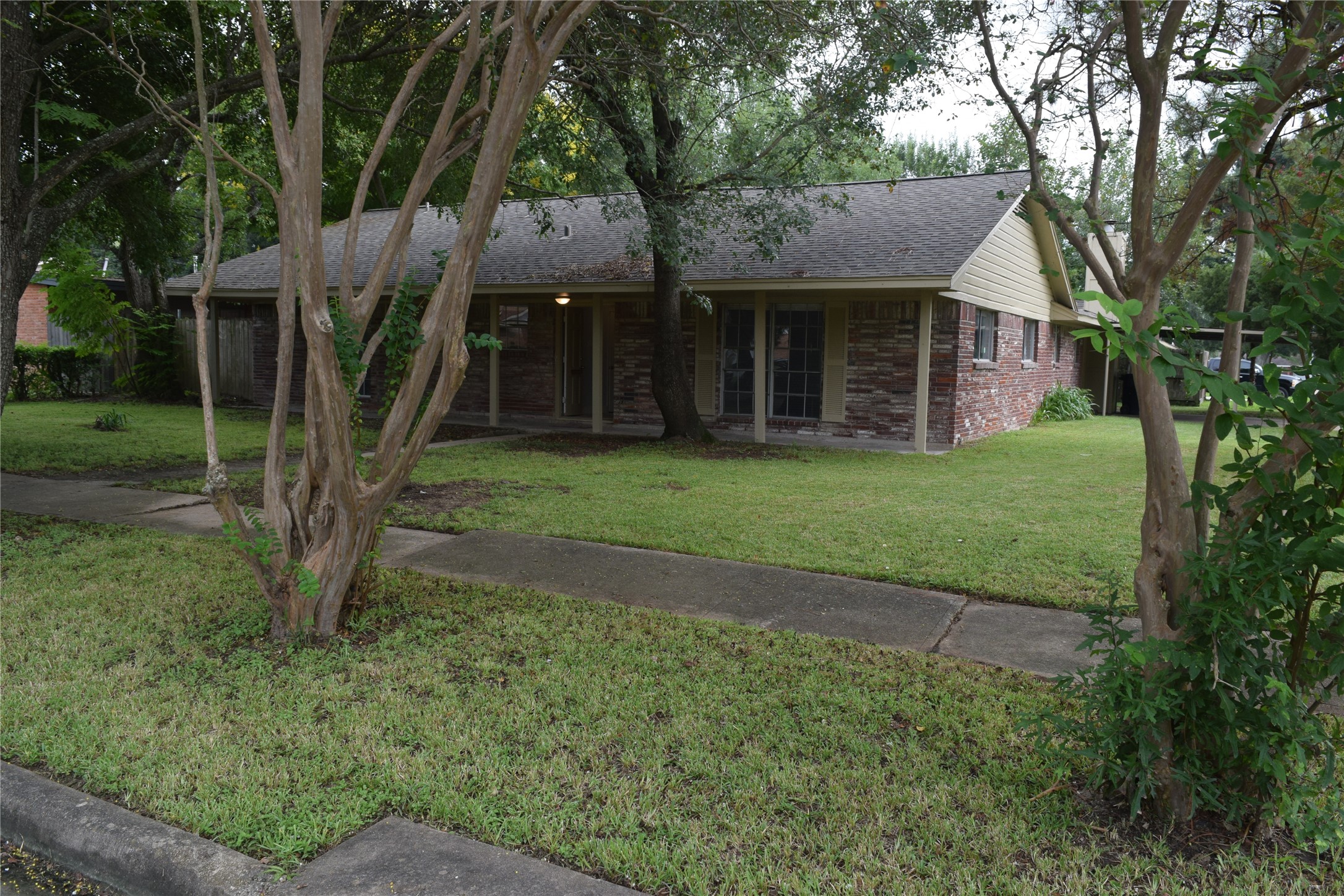 9902 Tolman Street Houston, TX 77034 - Photo 22 of 26 a view of a yard in front of house