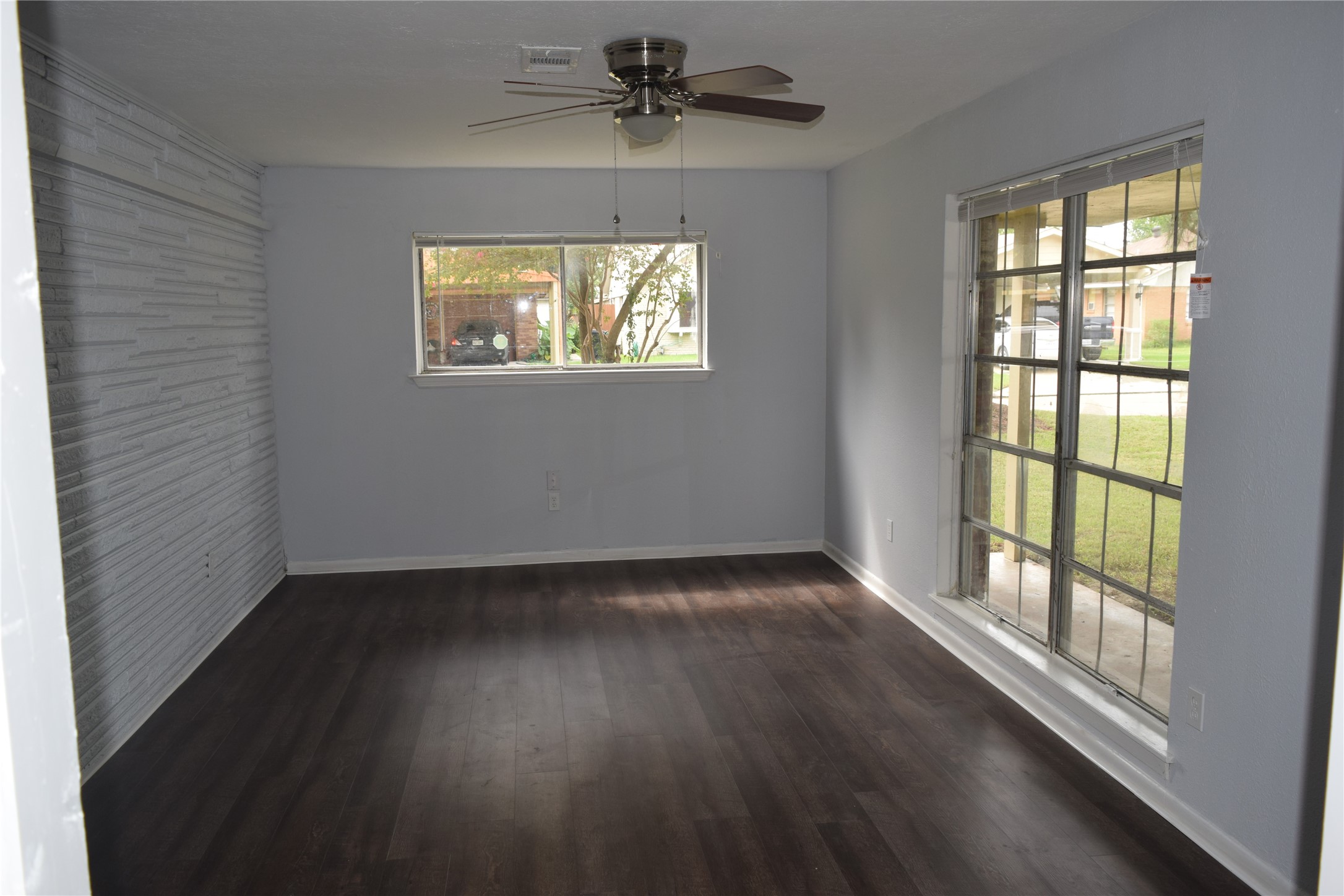 9902 Tolman Street Houston, TX 77034 - Photo 3 of 26 an empty room that has a window