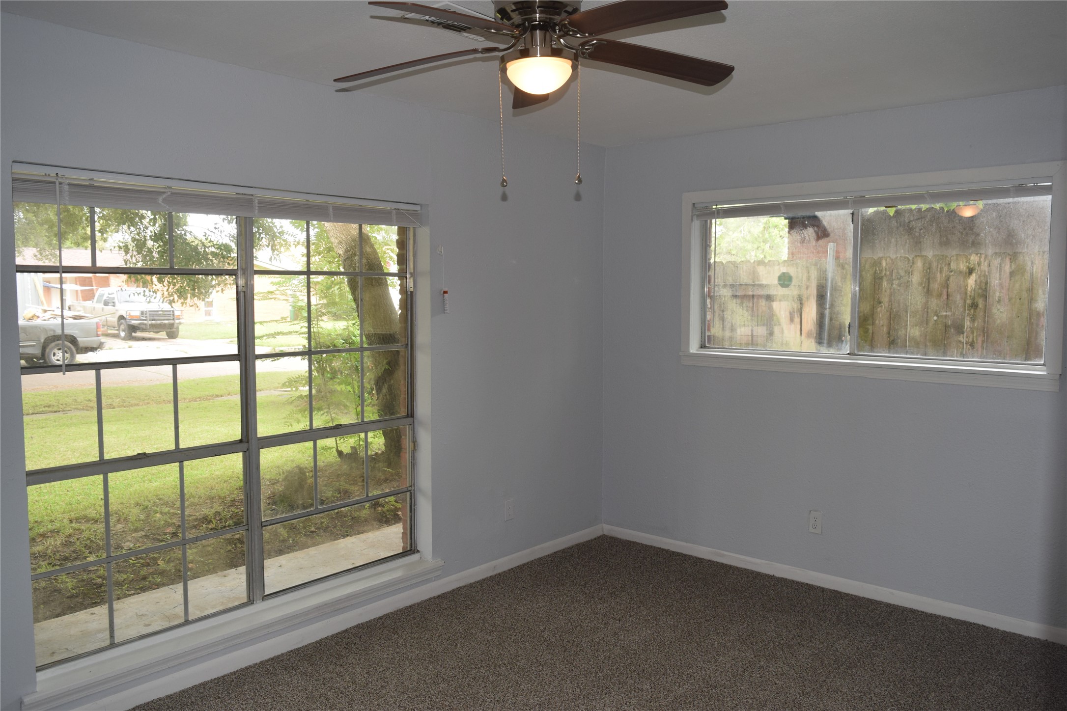 9902 Tolman Street Houston, TX 77034 - Photo 7 of 26 an empty room with a window