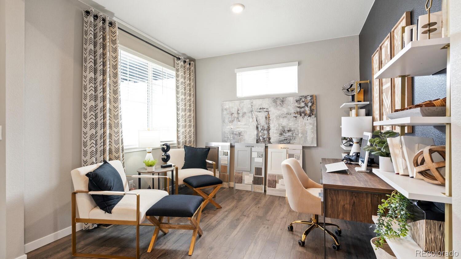 1531 Pinnacle Avenue Lochbuie, CO 80603 - Photo 16 of 25 a living room with furniture and a window