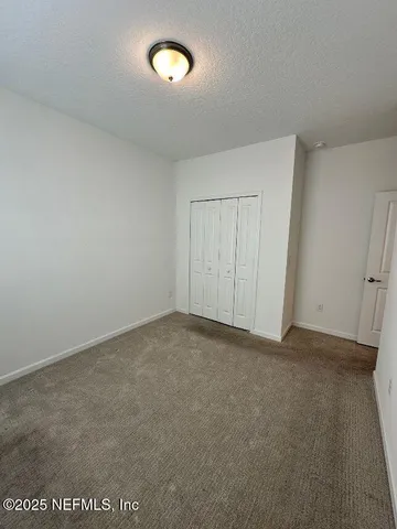 an empty room with a natural light