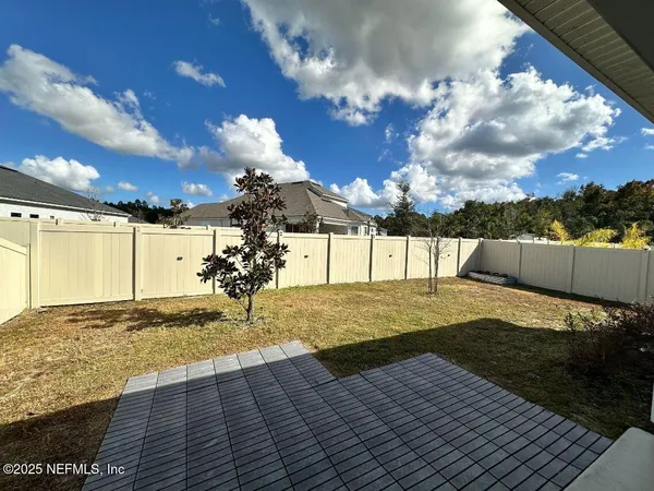 a view of a porch with seating space