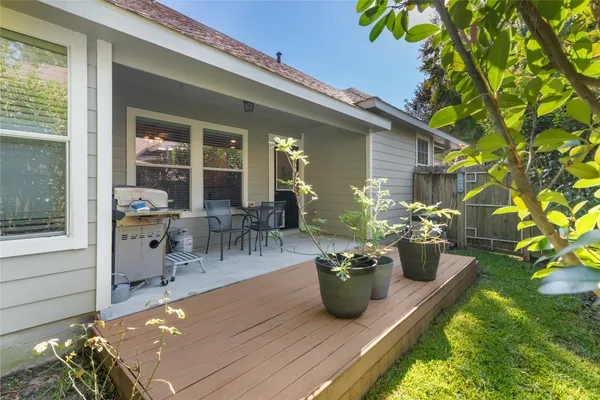 a view of a chairs and table in a patio