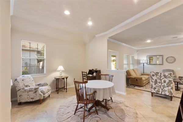 a living room with furniture and window